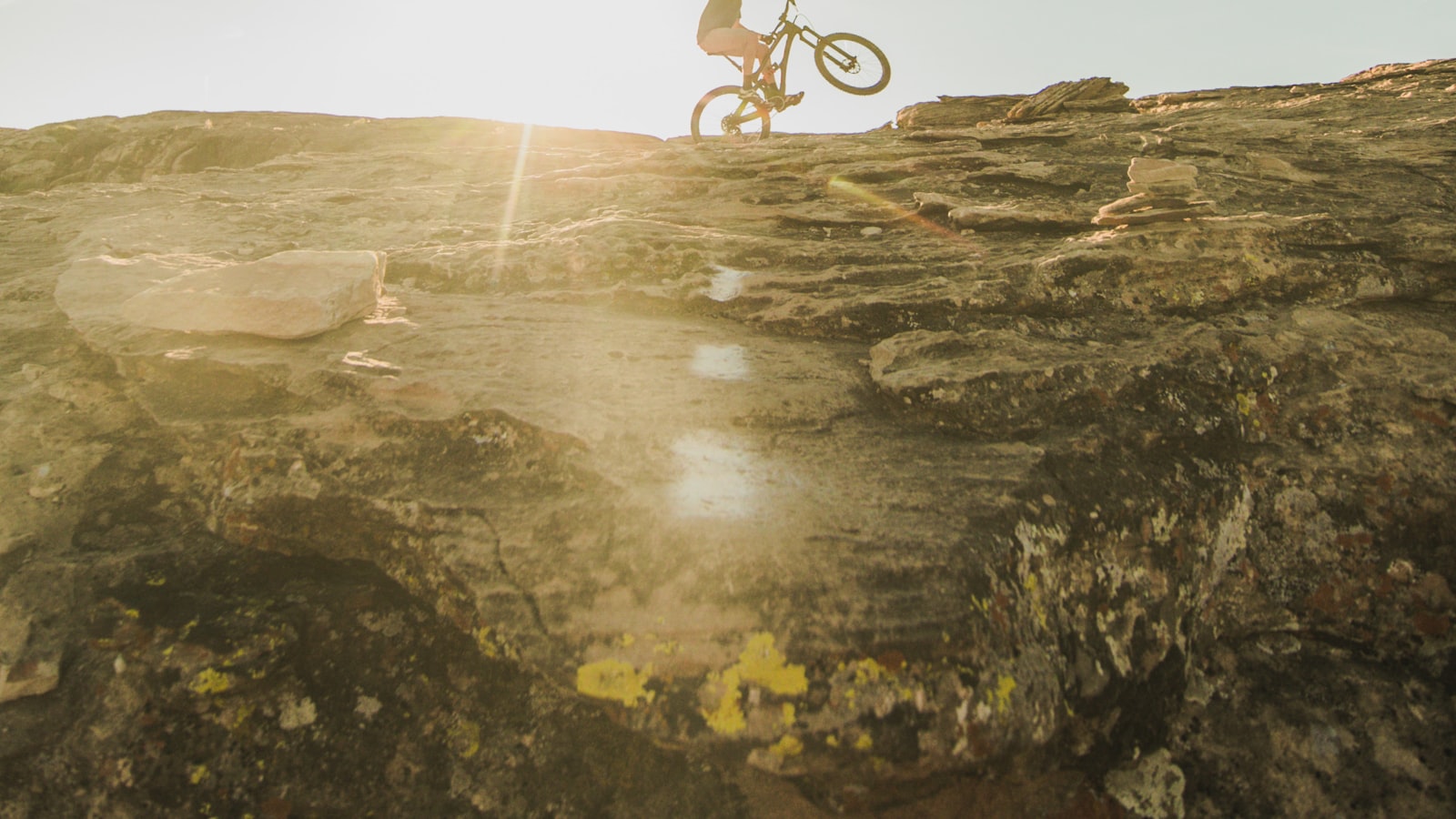 Cyclist eating a snack on a ride
