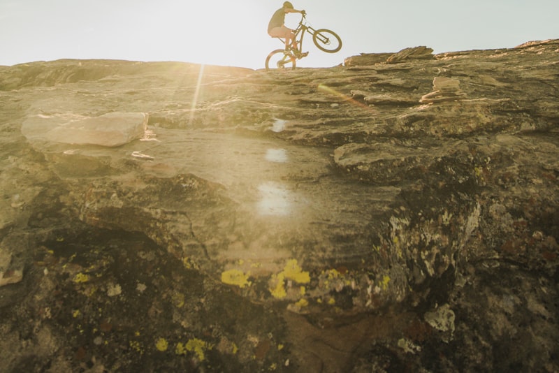 Cyclist eating a snack on a ride